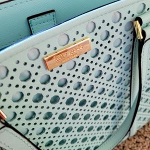 Blue Kate Spade purse, hand held or shoulder strap